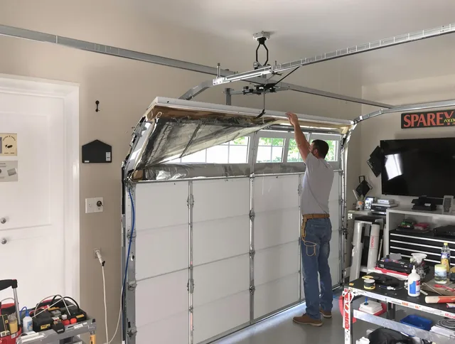 Garage door section replacement by Lauderhill Garage Door Repair in Lauderhill