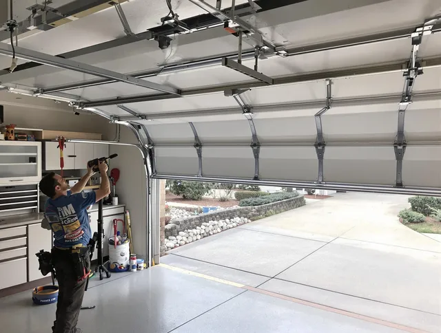 Garage door track repair service by Lauderhill Garage Door Repair in Lauderhill